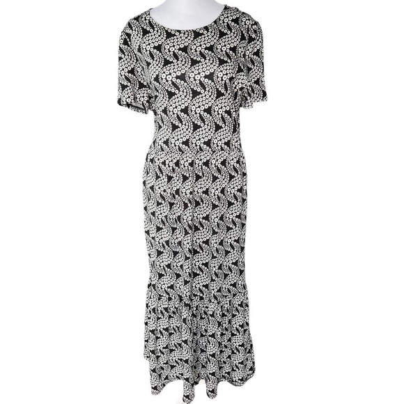 Boden - Tiered Easy Jersey Midi Dress
Black Daisy Swirl Sz 10 - Picture 4 of 9